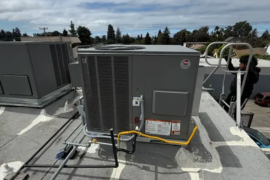 Existing Rheem rooftop HVAC equipment at an Oakland project